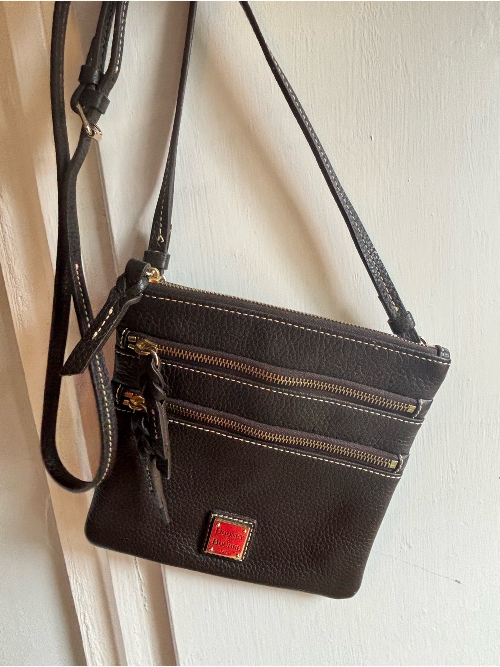 Dooney & Bourke Dark Brown Pebble Leather Triple-Zip Crossbody